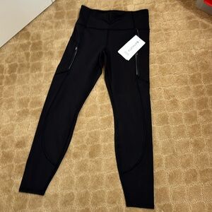 Athleta Black Leggings with Zip Pockets